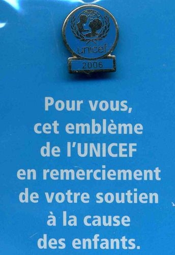Pin´s UNICEF sous pochette